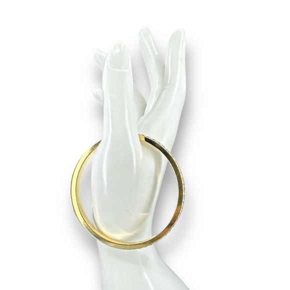 Avon Jewelry - Avon Bangle Rhinestone Over Gold Tone